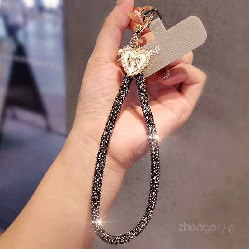 Silver and Black Heart Tag Rhinestone Wrist Strap with Gray Attachment Patch